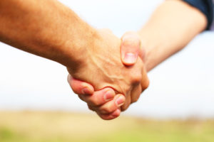 Closeup of people shaking hands